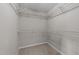 Walk-in closet with wall-mounted shelving at 5301 Tilford Ln, Raleigh, NC 27613
