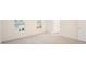Bedroom features neutral walls, carpet flooring, large windows allowing ample natural light at 6029 Sodium St, Raleigh, NC 27610