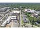 Birds eye view shows these townhomes are near shopping centers at 605 Smedes Pl # A, Raleigh, NC 27605