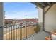 Balcony showing the black metal rails and the view at 605 Smedes Pl # A, Raleigh, NC 27605