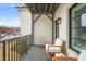 Cozy balcony features outdoor seating and a view of the lively street at 605 Smedes Pl # A, Raleigh, NC 27605