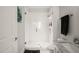Sleek bathroom with a glass shower, vanity with a marble countertop, and updated fixtures at 605 Smedes Pl # A, Raleigh, NC 27605