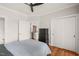 Bedroom with hardwood floors and access to a bathroom and closet storage at 605 Smedes Pl # A, Raleigh, NC 27605