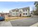 Charming townhome with a well-kept lawn and inviting curb appeal at 605 Smedes Pl # A, Raleigh, NC 27605