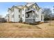Back exterior showing the multiple balconies of this unit at 605 Smedes Pl # A, Raleigh, NC 27605