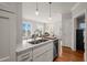 Bright kitchen showcases a spacious island, stainless steel appliances, and an open layout leading to living areas at 605 Smedes Pl # A, Raleigh, NC 27605