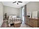 Inviting bedroom with carpet, neutral walls, and window with natural light at 6480 Beaver Creek Rd, New Hill, NC 27562