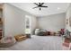 Spacious room with carpet, neutral walls, ceiling fan and ample natural light at 6480 Beaver Creek Rd, New Hill, NC 27562