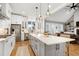 Expansive kitchen featuring a large center island, stainless steel appliances, and open floor plan at 6480 Beaver Creek Rd, New Hill, NC 27562