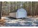 Storage shed with a roll up door at 6480 Beaver Creek Rd, New Hill, NC 27562