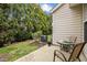 Back patio with seating and a view of the yard at 7628 Winners Edge St, Raleigh, NC 27617