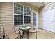 Cozy patio area with table and chairs, perfect for relaxing outdoors at 7628 Winners Edge St, Raleigh, NC 27617