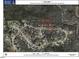 An aerial view of a community showing lot lines with surrounding trees and proximity to Carlton Street and Winston Plantation at 765 Carlton St, Clayton, NC 27520