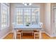 Cozy breakfast area with large windows, natural light and access to the back porch at 765 Carlton St, Clayton, NC 27520