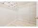 Walk-in closet featuring wood floors, adjustable wire shelving, and neutral paint at 765 Carlton St, Clayton, NC 27520
