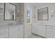 Elegant bathroom with double vanities, modern fixtures, and ample counter space, perfect for a luxurious feel at 810 Maple Berry Ln # 105, Raleigh, NC 27607