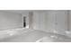 Neutral bedroom featuring closets, carpet, and entry to ensuite bathroom at 810 Maple Berry Ln # 105, Raleigh, NC 27607