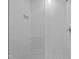 Modern shower with white subway tile, glass door and built in storage at 810 Maple Berry Ln # 105, Raleigh, NC 27607