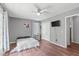 Cozy bedroom with hardwood floors, ceiling fan and closet at 900 Stoneybrook Dr, Sanford, NC 27330