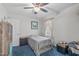Cozy bedroom featuring a ceiling fan, neutral wall paint, and comfortable bed at 900 Stoneybrook Dr, Sanford, NC 27330