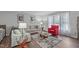 Inviting living room with hardwood floors, neutral tones, and comfortable seating arrangements at 900 Stoneybrook Dr, Sanford, NC 27330