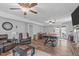 Spacious living room featuring a pool table, fireplace, and comfortable seating at 900 Stoneybrook Dr, Sanford, NC 27330