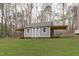 This backyard shed has lots of room and has two overhangs for storing equipment outside at 900 Stoneybrook Dr, Sanford, NC 27330