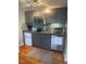 A modern kitchen with stainless steel appliances and a sleek design at 907 St Marys St, Raleigh, NC 27605