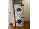 Efficient laundry area with stackable washer and dryer units at 907 St Marys St, Raleigh, NC 27605