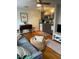 Comfortable living room with hardwood floors open to a modern kitchen at 907 St Marys St, Raleigh, NC 27605