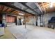 Spacious unfinished basement featuring exposed ceiling, concrete floors, and visible mechanical systems at 9320 Teton Pines Way, Raleigh, NC 27617