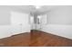Bedroom features hardwood floors, neutral paint, ceiling fan, and walk-in closet at 9320 Teton Pines Way, Raleigh, NC 27617