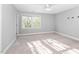Bright, spacious bedroom with plush carpeting and natural light at 9320 Teton Pines Way, Raleigh, NC 27617