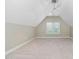 Large Bonus room featuring neutral carpet, neutral paint, recessed lighting, and a large window at 9320 Teton Pines Way, Raleigh, NC 27617
