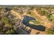 The expansive golf course features manicured greens, strategic bunkers, and picturesque water features at 9320 Teton Pines Way, Raleigh, NC 27617