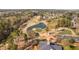 Scenic golf course with pristine fairways, sparkling water features, and lush greenery, perfect for a relaxing round of golf at 9320 Teton Pines Way, Raleigh, NC 27617