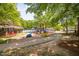 Community playground area with slides, structures, and picnic area at 101 Hunting Chase # 2B, Cary, NC 27513