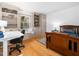 Cozy bedroom with custom built-ins, built in window seat, hardwood floors and neutral paint at 109 Barcliff Ter, Cary, NC 27518