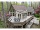 Expansive deck perfect for outdoor dining and lounging, with views of lush greenery at 109 Barcliff Ter, Cary, NC 27518