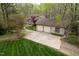 Exterior view showcasing a home with a two-car garage and well-kept lawn at 109 Barcliff Ter, Cary, NC 27518