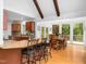 Bright open-concept kitchen with granite counters, stainless appliances, breakfast bar and light filled dining area at 109 Barcliff Ter, Cary, NC 27518