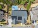 Birds eye view of the home featuring an outdoor kitchen, basketball court and solar panels at 113 Bennett Mountain Trce, Chapel Hill, NC 27516