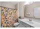 Bathroom featuring a patterned shower curtain, a single vanity and a toilet at 113 Bennett Mountain Trce, Chapel Hill, NC 27516