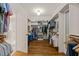 Spacious walk-in closet with custom shelving, hardwood floors, and ample storage space at 113 Bennett Mountain Trce, Chapel Hill, NC 27516