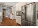 Modern kitchen with stainless appliances, ample storage, and easy access to the rest of the home at 113 Bennett Mountain Trce, Chapel Hill, NC 27516