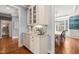 Charming kitchen area with granite countertops, appliances, and seamless access to a dining room at 113 Bennett Mountain Trce, Chapel Hill, NC 27516