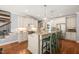 Bright kitchen with a central island, barstool seating, stainless appliances, and ample counter space at 113 Bennett Mountain Trce, Chapel Hill, NC 27516