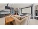 Media room with wet bar, large projector screen, and comfortable seating creating the perfect relaxation space at 113 Bennett Mountain Trce, Chapel Hill, NC 27516