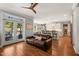 Open-concept living room seamlessly connects the kitchen and dining area to a bright, comfortable space at 113 Bennett Mountain Trce, Chapel Hill, NC 27516