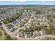 Aerial view of a suburban neighborhood with well-maintained homes and tree-lined streets at 113 Bennett Mountain Trce, Chapel Hill, NC 27516